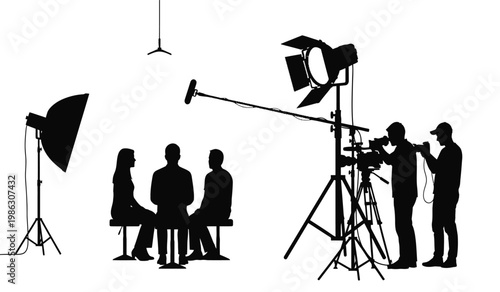 A stark black silhouette depicts a film set with studio lights a camera operator and seated subjects showcasing a dramatic silhouette high quality professional