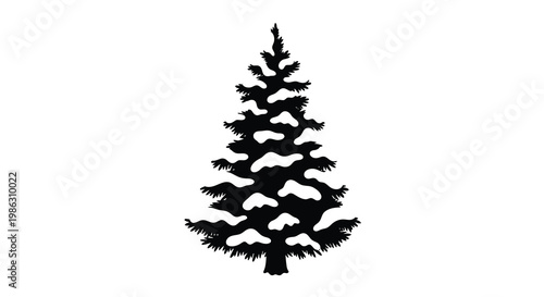 A silhouetted evergreen tree heavily covered in fresh white snowfall