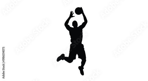 Silhouette of a basketball player jumping to make a shot