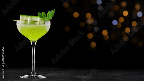 Green Cocktail Glass With Bokeh