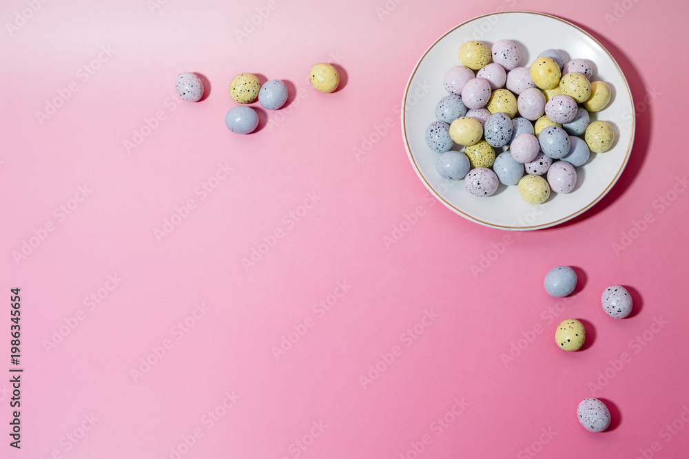 Obraz premium Mini Speckled Chocolate Easter Eggs on Pink Background