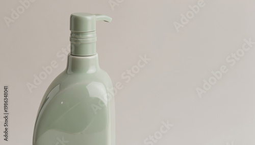 A bottle of liquid sitting on a table