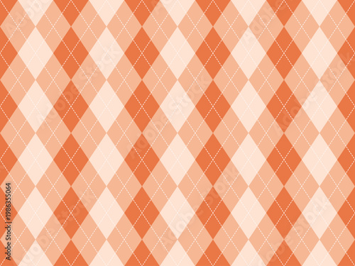 Argyle pattern seamless background in orange for fall fashion