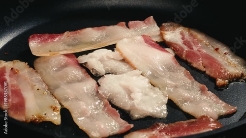 Fat tailed sheep lamb Lard with a golden crust is melted in a stainless steel pan. Cooking traditional uzbek dish, middle eastern food. 