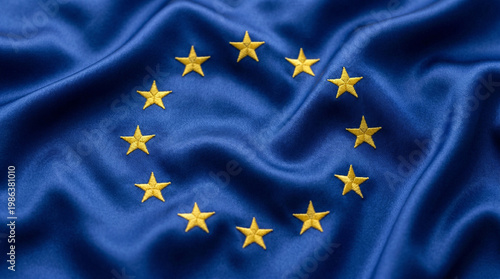 Waving European Union flag on smooth blue silk fabric, concept of EU diplomacy, economy and political stability