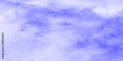 A beautiful summer day view of a bright blue sky with white clouds and clear sunlight creates an abstract nature background of the high atmosphere