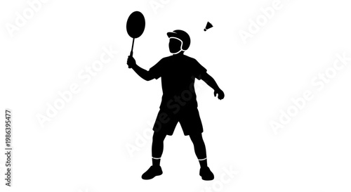 Silhouette of Man Playing Badminton Alone.