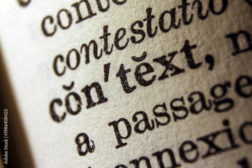 Word context printed on dictionary page, macro close up