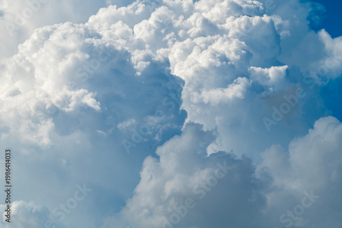 Cumulus clouds in blue sky