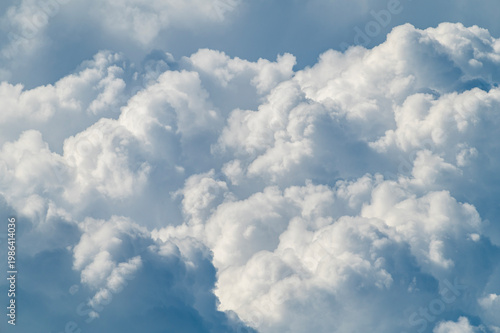 Cumulus clouds in blue sky
