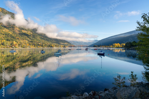 Kootenay Lake Calm Anchorage at Dawn Nelson. Boats at anchor on calm Kootenay Lake in Nelson, British Columbia. 
