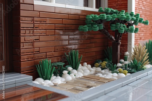 Miniature brick house facade with landscaping, featuring a tree, plants, and a walkway