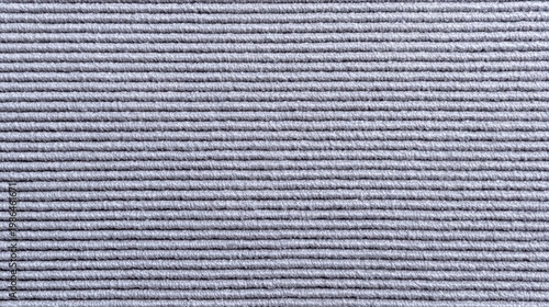 Detailed gray corduroy fabric texture with prominent horizontal ribbed pattern