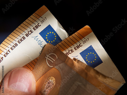 European Banknotes in Hands: Close-Up Focus