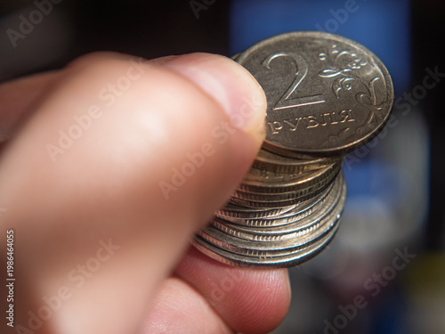 Two Russian Rubles Coin Held in Hand