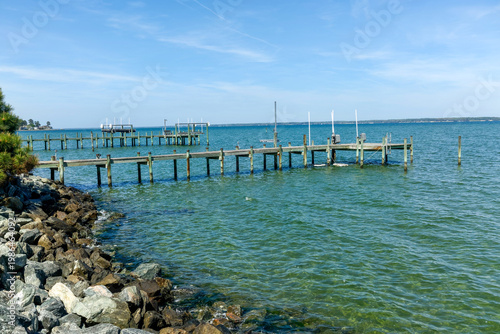 Old weathered dock on river