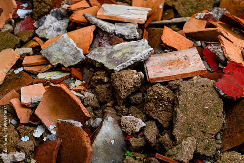 Close up of pile of broken tiles and concrete