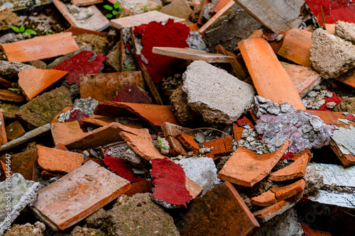 Close up of pile of broken tiles and concrete