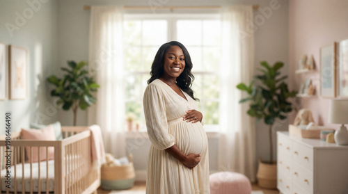 Expectant mother in nursery touching belly expressing peaceful maternal bond and hopeful anticipation for lifestyle parenting magazine editorial photography