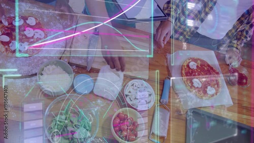 3 teens reaching slicing tomatoes adding mushrooms while holo graphs guiding pizza prep for friends