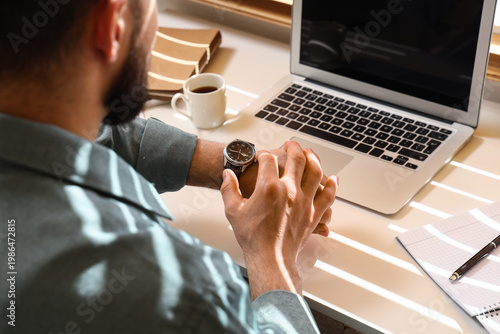 Man with stylish wristwatch...