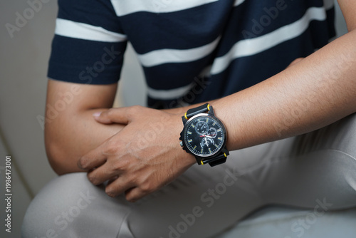 Photos Casual Man Wearing Black Chronograph Watch with Modern Street Style Outfit