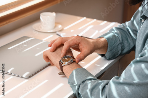 Man with stylish wristwatch...