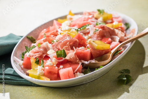 Summer salad with water-melon mint and prosciutto.