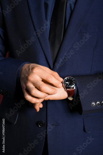 Businessman in suit with st...