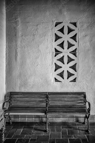 Moorish Room with a Vented Window and an Old Wooden Bench.
