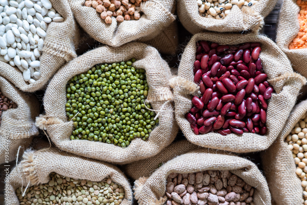 Fototapeta premium Assorted beans in burlap sacks