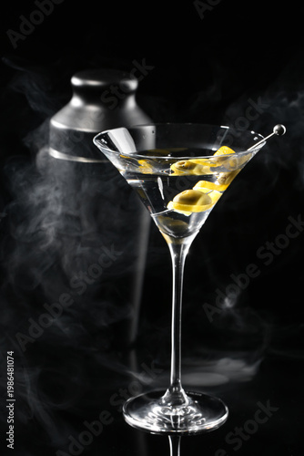 Shaker with glass of tasty ...