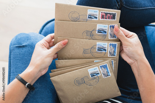 Фотография Person holding vintage envelopes photo
