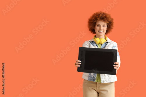 Redhead female graphic desi...