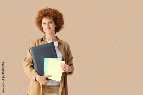 Redhead female graphic desi...