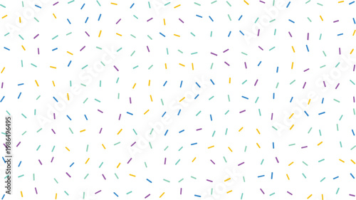 A cheerful sprinkle pattern showcasing various colorful candy pieces spread across a crisp white surface