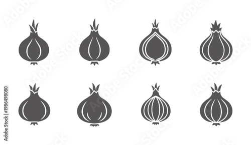 Eight dark grey onion showing whole and halved bulbs vegetable food ingredient