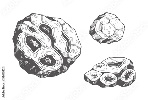Three rough textured stones with internal cavities and crystalline facets rock mineral