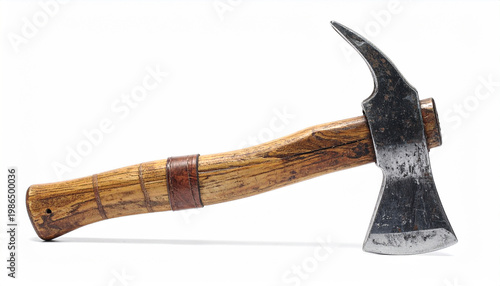 Vintage firefighter axe with sharp metal head and weathered wooden handle