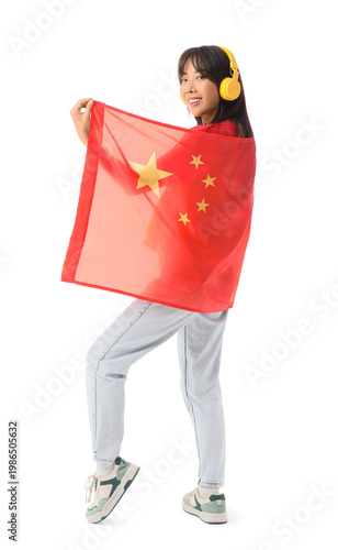 Young Asian woman in headph...
