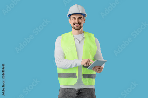 Male architect working with...