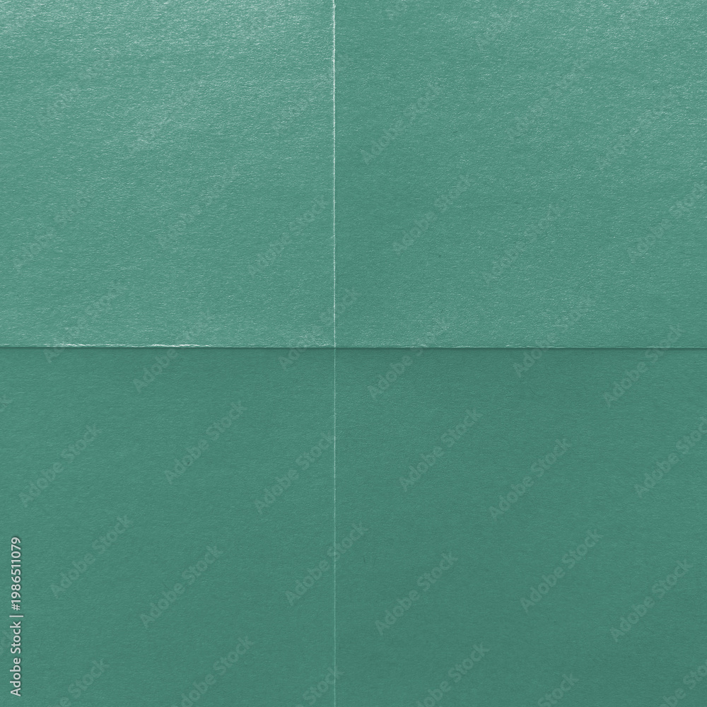 Fototapeta premium Textured teal paper background with copy space