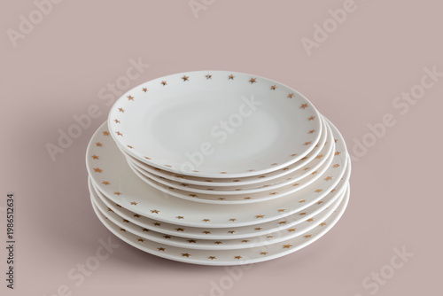 Stack of clean white plates...