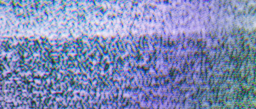 Fototapeta premium Macro shot of heavily distorted crt tv static with vivid purple blue and pink pixel texture