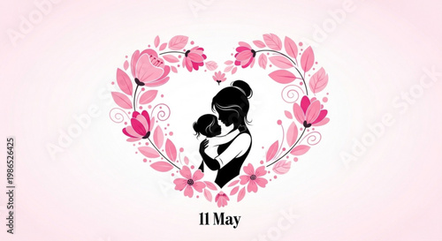Mother and child hug surrounded by pink floral heart wreath on white and pink background for mother's day