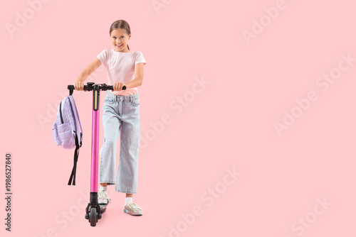 Cute schoolgirl with electr...