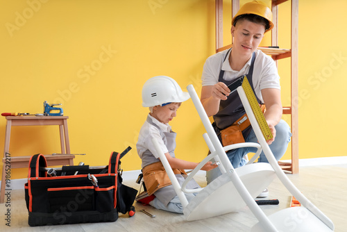 Male worker with his little...