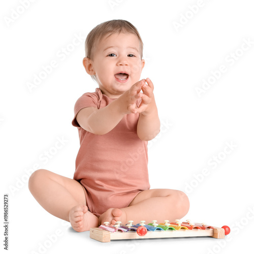 Cute baby playing with xylo...