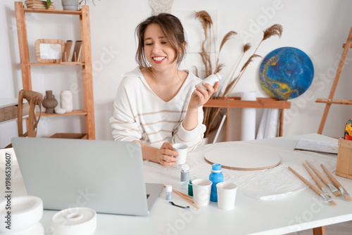Young woman giving online m...