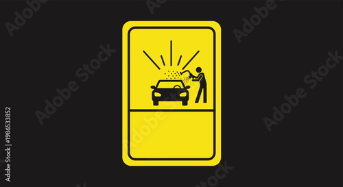 Yellow caution sign showing a person using a pressure washer to clean a car against a dark background for automotive service themes.